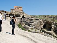 Девушка в черном, с фотоаппартом